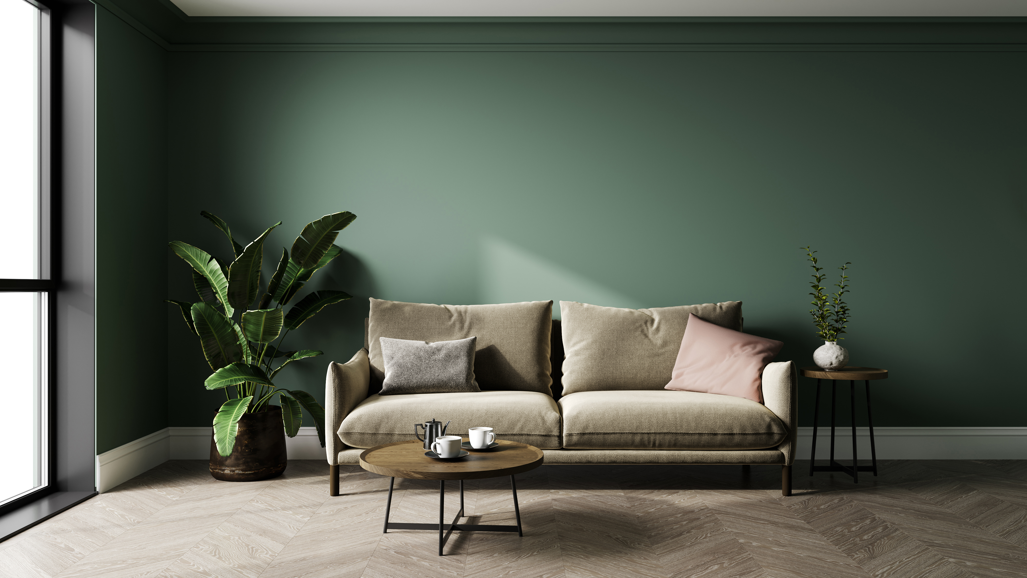 minimalist green living room with beige sofa and herringbone wood floor